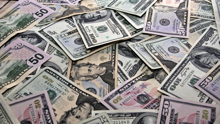 El dólar oficial ya alcanzó la previsiones promedio para 2014