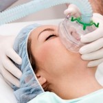 Beautiful patient receives anaesthetic in hospital