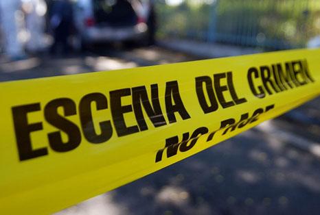 Asesinan a una mujer en un enfrentamiento entre bandas