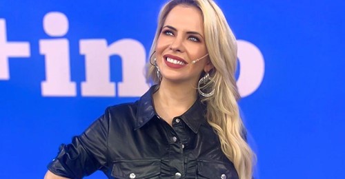 De espaldas y en pantalón blanco, Alejandra Maglietti puso de rodillas al verano