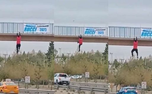 Dramático momento: estaba poniendo un cartel y quedó colgado de un puente sobre una ruta