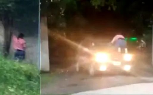 Esperó a que su esposo salga del «telo» para tirarse encima del parabrisas y escracharlo a los gritos