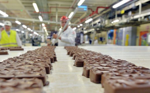 Dos empleados quedaron atrapados en un tanque de una fábrica de chocolate