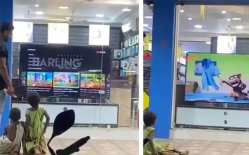 Un comerciante deja prendido el televisor de la vidriera para que los niños puedan ver dibujitos